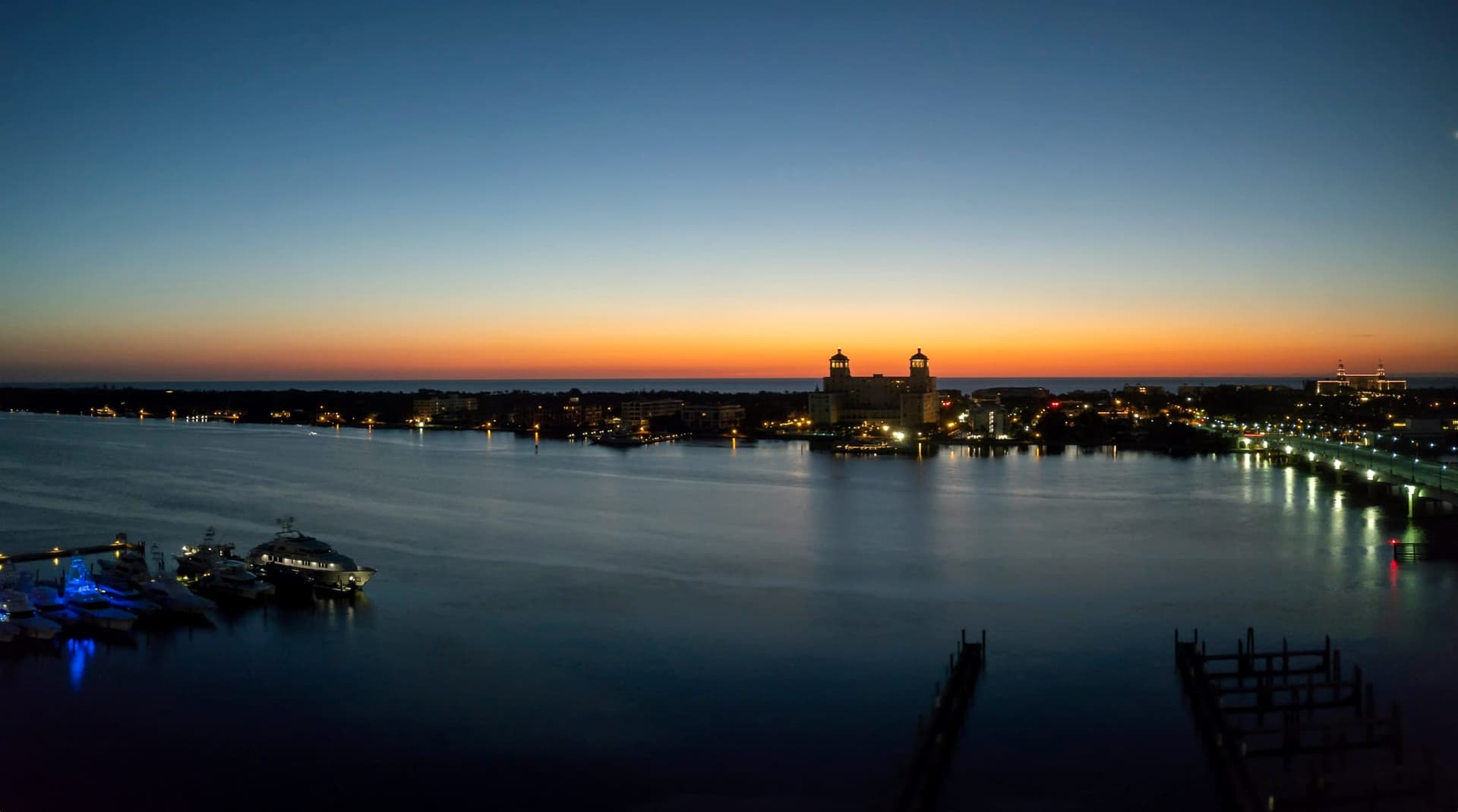 The West Palm Beach skyline across the Lake Worth Lagoon at dusk